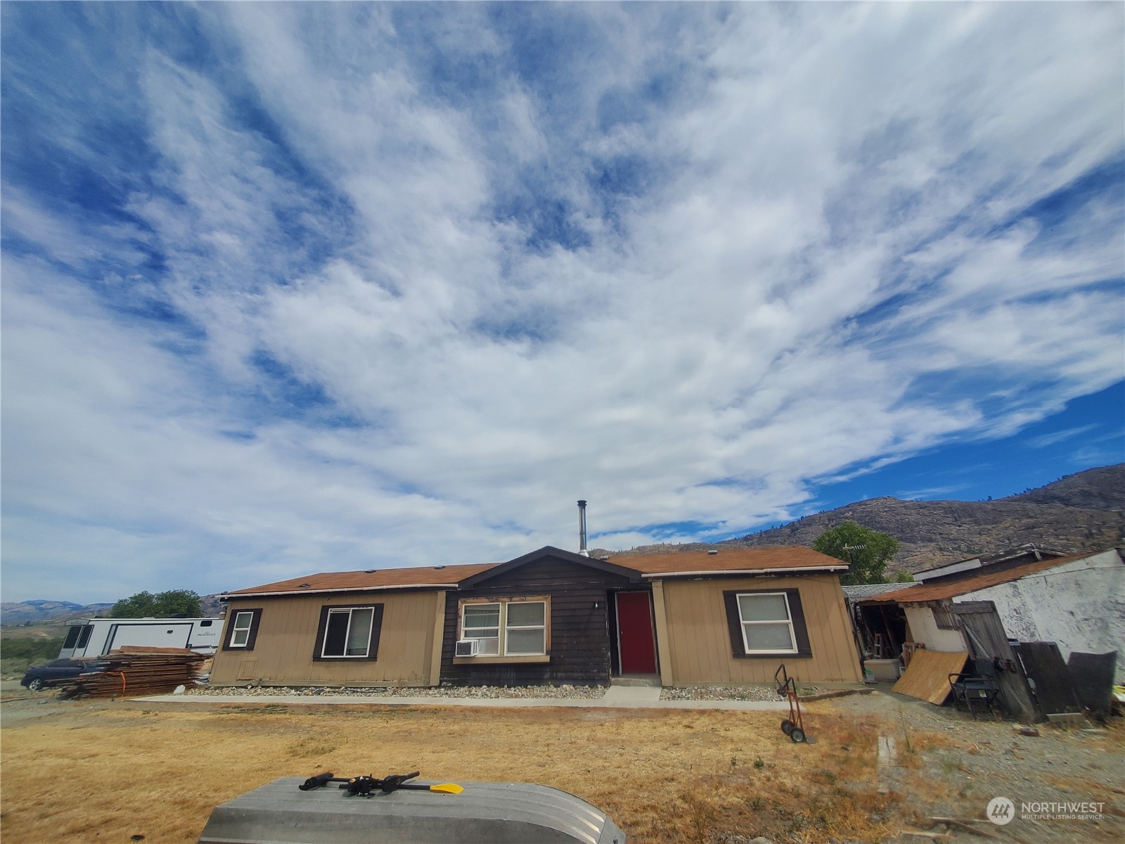 507 Mt Olive Road Riverside, WA 98849 - Photo 5 of 23 a front view of a house with yard
