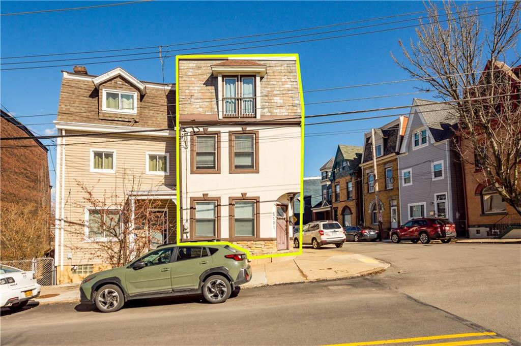 5101 Carnegie Street Pittsburgh, PA 15201 - Photo 2 of 34 a car parked in front of a house