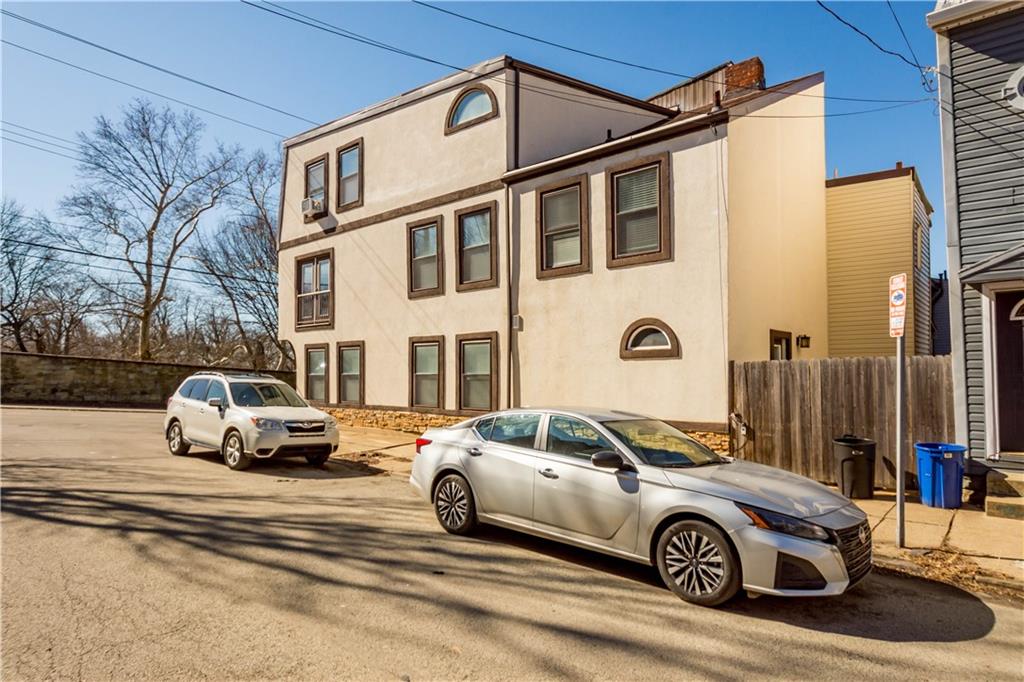5101 Carnegie Street Pittsburgh, PA 15201 - Photo 34 of 34 a car parked in front of a house