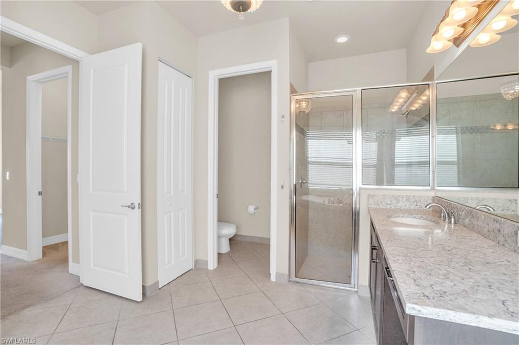 4420 Aurora Street Naples, FL 34119 - Photo 11 of 50 Primary Bathroom