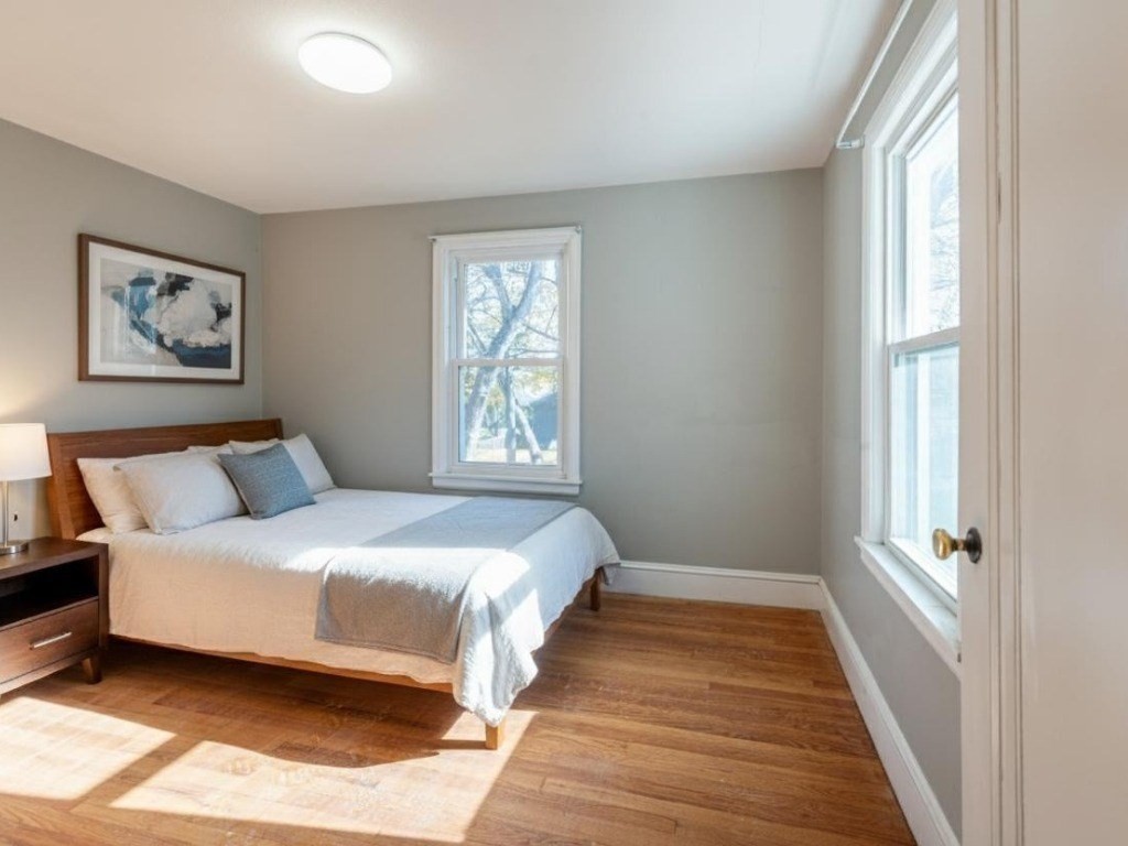 19 Roosevelt Avenue Springfield, MA 01118 - Photo 15 of 27 a bedroom with a bed and a window