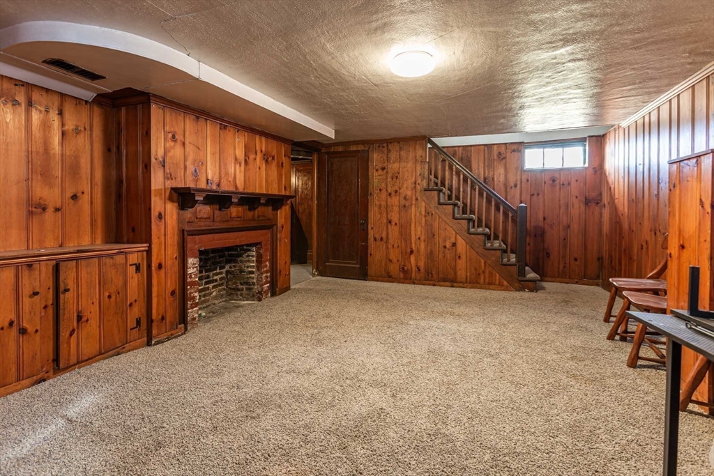 19 Roosevelt Avenue Springfield, MA 01118 - Photo 22 of 27 a view of an empty room with furniture and a window