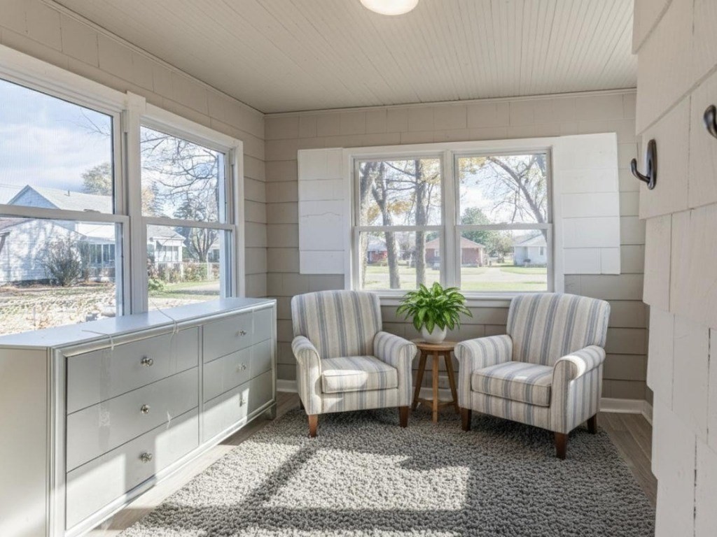 19 Roosevelt Avenue Springfield, MA 01118 - Photo 24 of 27 a living room with furniture and a large window