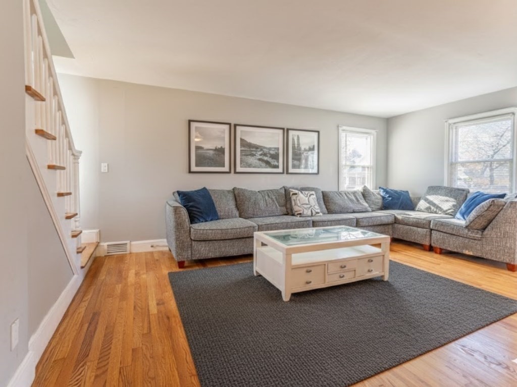 19 Roosevelt Avenue Springfield, MA 01118 - Photo 4 of 27 a living room with furniture and a couch