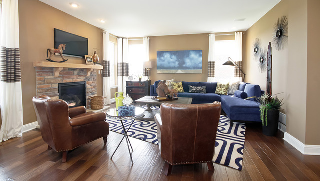 2098 Stapleton Road New Lenox, IL 60451 - Photo 3 of 14 a living room with furniture a flat screen tv and a fireplace