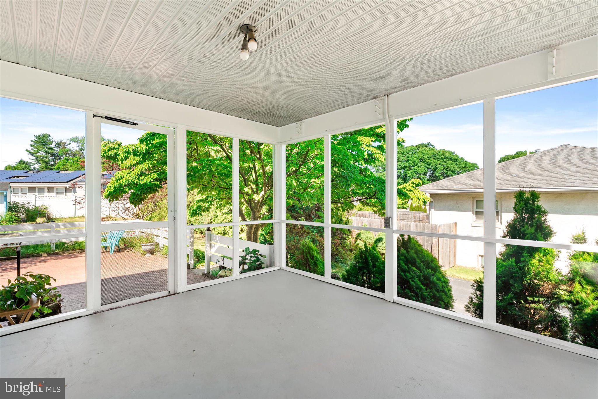 3639 State Extension Trenton, NJ 08619 - Photo 26 of 33 Serene screened porch with lush views.