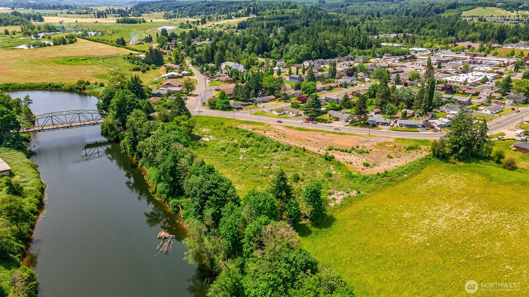 1601 Cooks Hill Road Centralia, WA 98531 - Photo 4 of 26 a view of a lake with a city