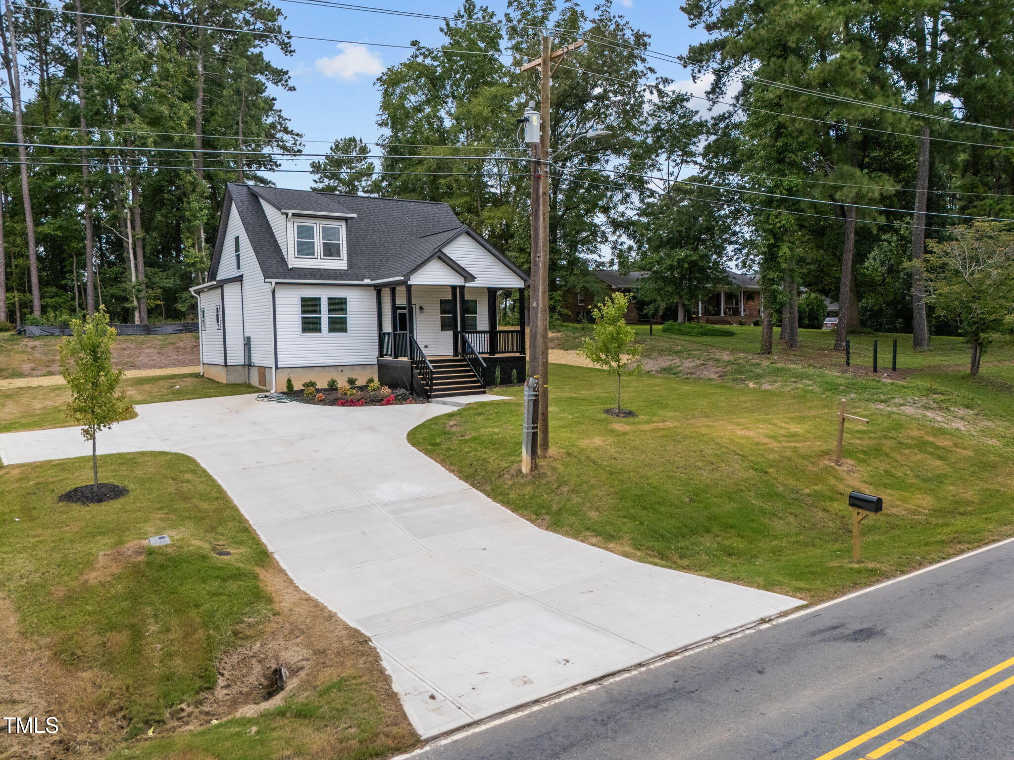525 North Hoover Road Durham, NC 27703 - Photo 11 of 45 a view of a house with a yard