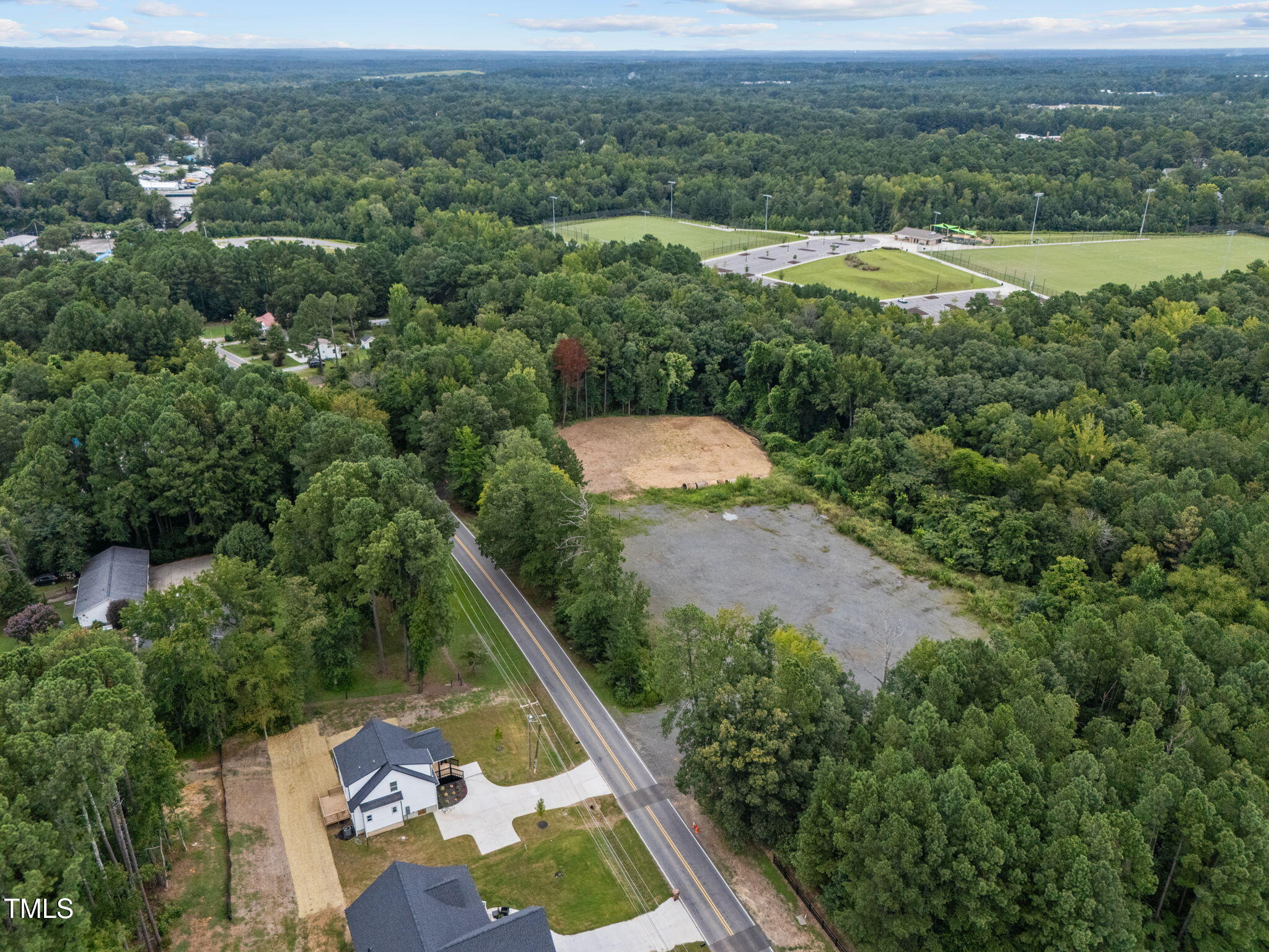 525 North Hoover Road Durham, NC 27703 - Photo 14 of 45 an aerial view of residential house with outdoor space