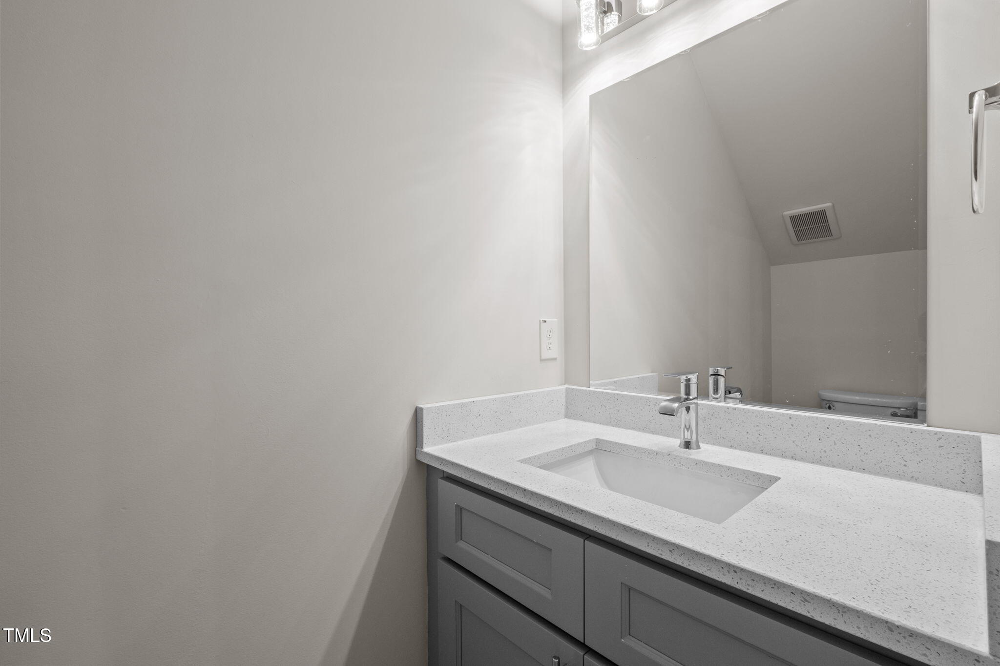 525 North Hoover Road Durham, NC 27703 - Photo 20 of 45 a bathroom with a sink and a mirror
