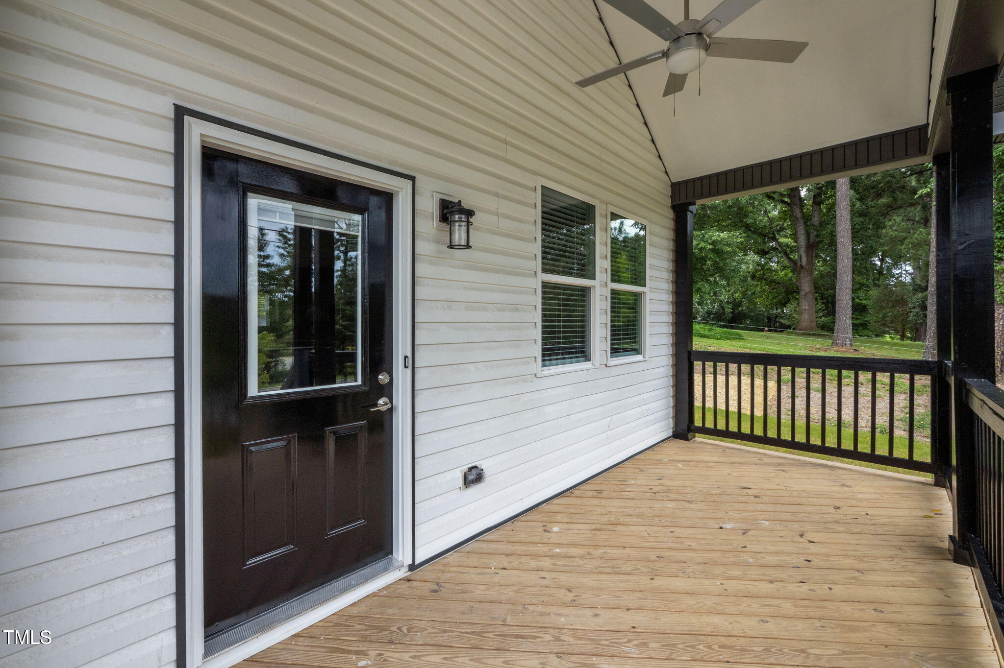 525 North Hoover Road Durham, NC 27703 - Photo 26 of 45 a view of a balcony with a ceiling fan