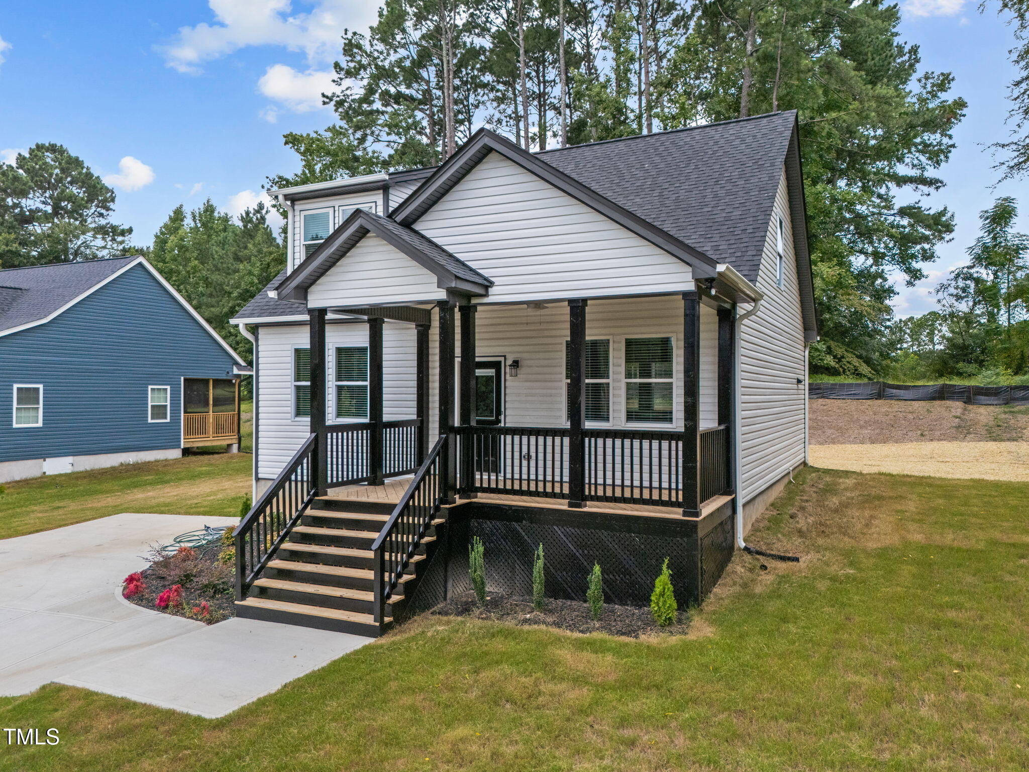 525 North Hoover Road Durham, NC 27703 - Photo 3 of 45 a house with swimming pool in front of it
