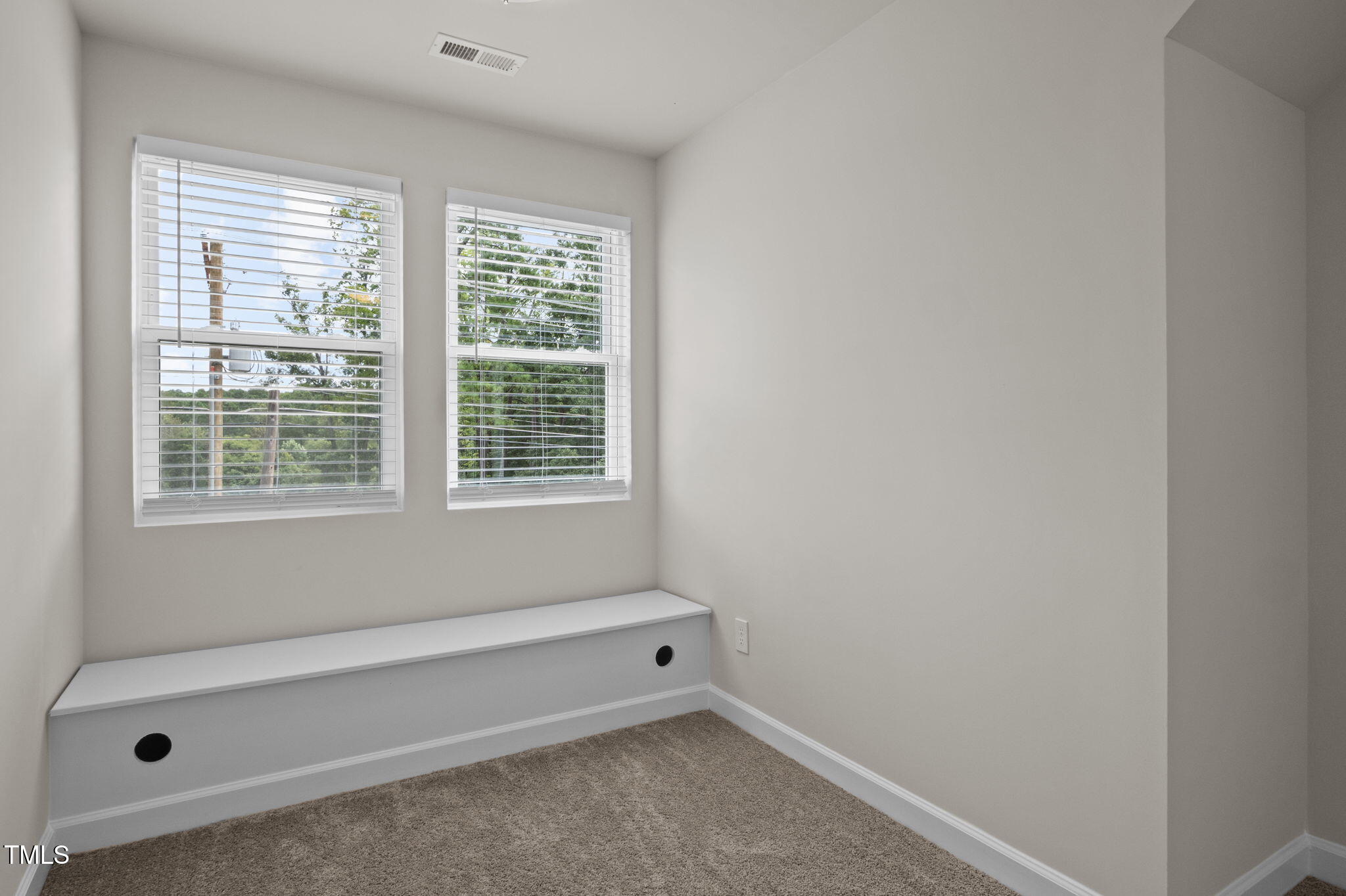 525 North Hoover Road Durham, NC 27703 - Photo 32 of 45 a bathroom with a window and a shower