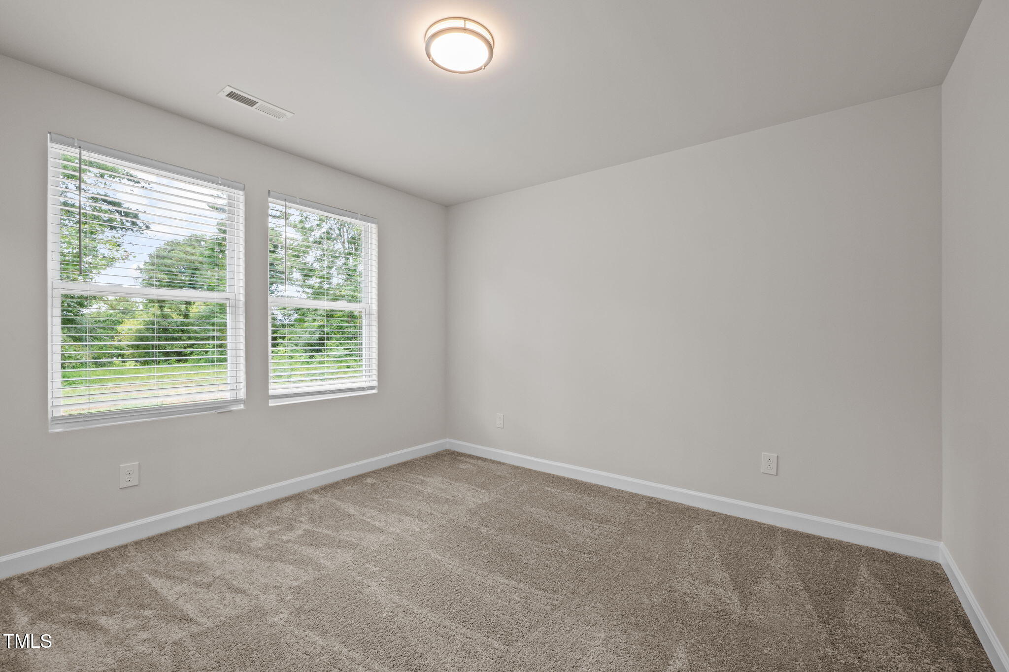 525 North Hoover Road Durham, NC 27703 - Photo 35 of 45 an empty room with a window