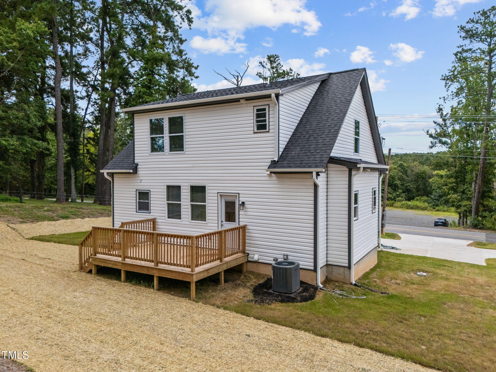 525 North Hoover Road Durham, NC 27703 - Photo 4 of 45 a backyard of a house with table and chairs