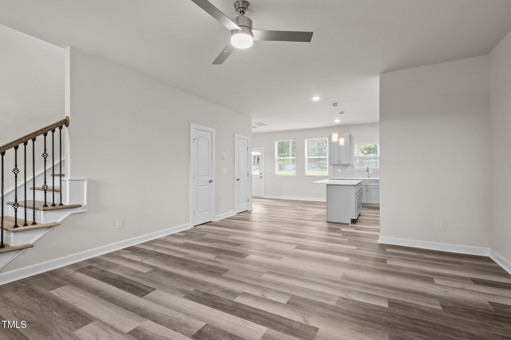 525 North Hoover Road Durham, NC 27703 - Photo 42 of 45 a view of an empty room with a window and wooden floor