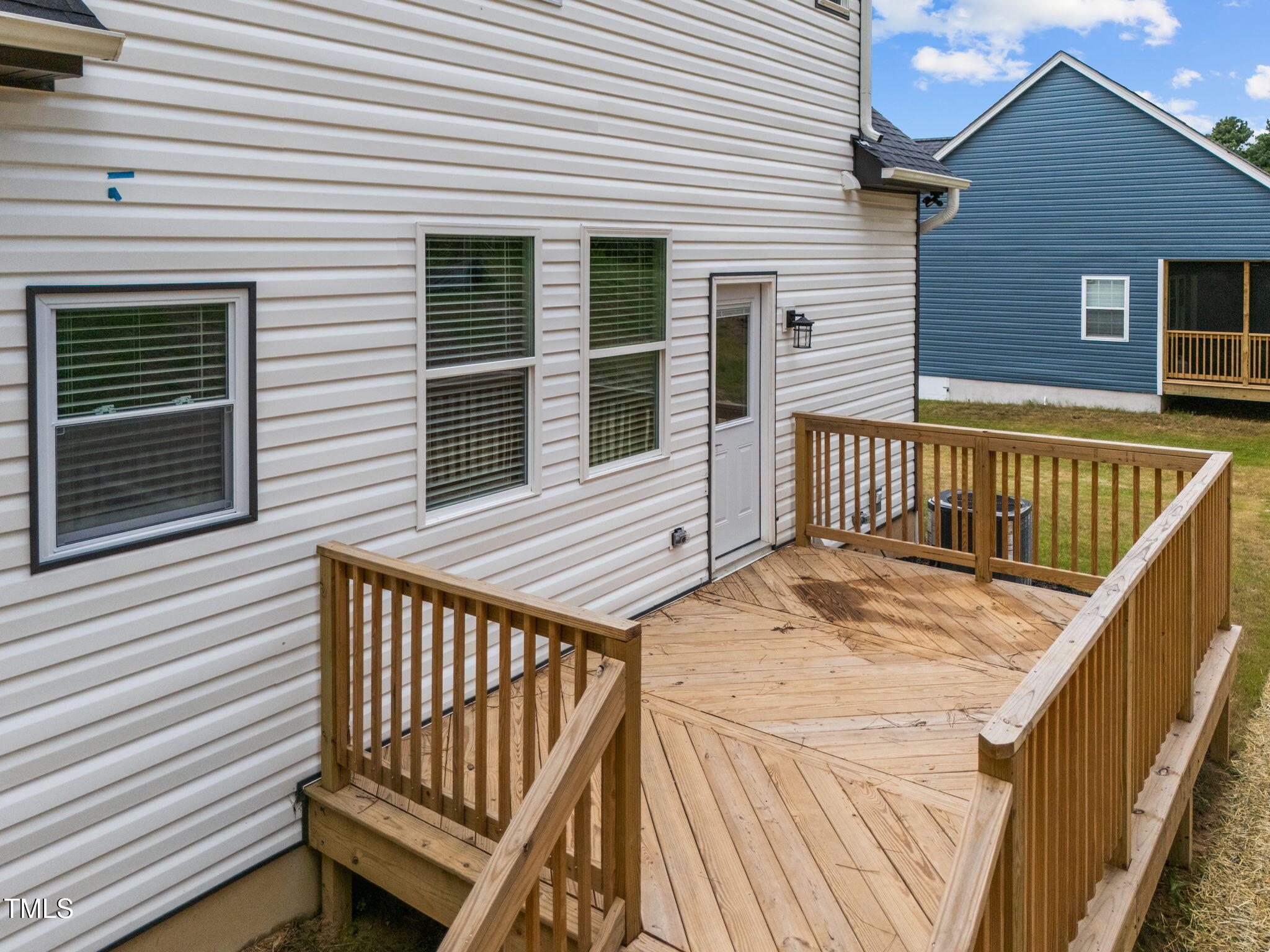525 North Hoover Road Durham, NC 27703 - Photo 6 of 45 a view of a wooden deck with a barbeque
