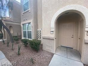 10550 West Alexander Road, Unit 1155 Las Vegas, NV 89129 - Photo 1 of 7 Doorway to property with stucco siding