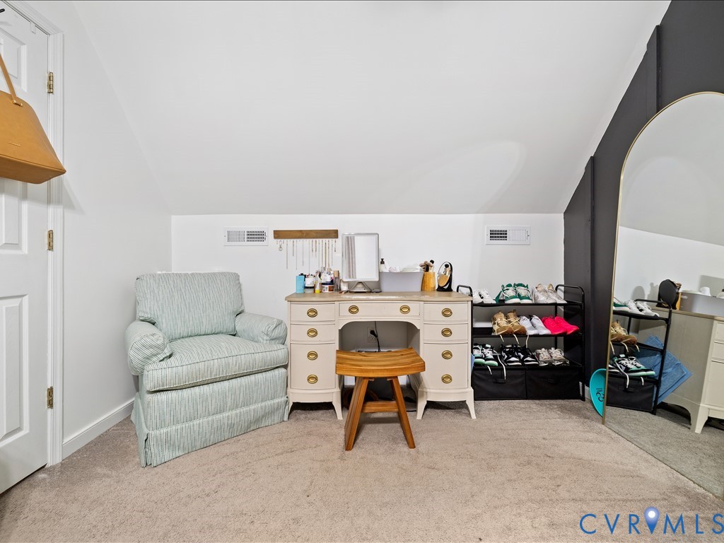 6806 Full Rack Circle Midlothian, VA 23112 - Photo 23 of 29 a living room with furniture and a flat screen tv