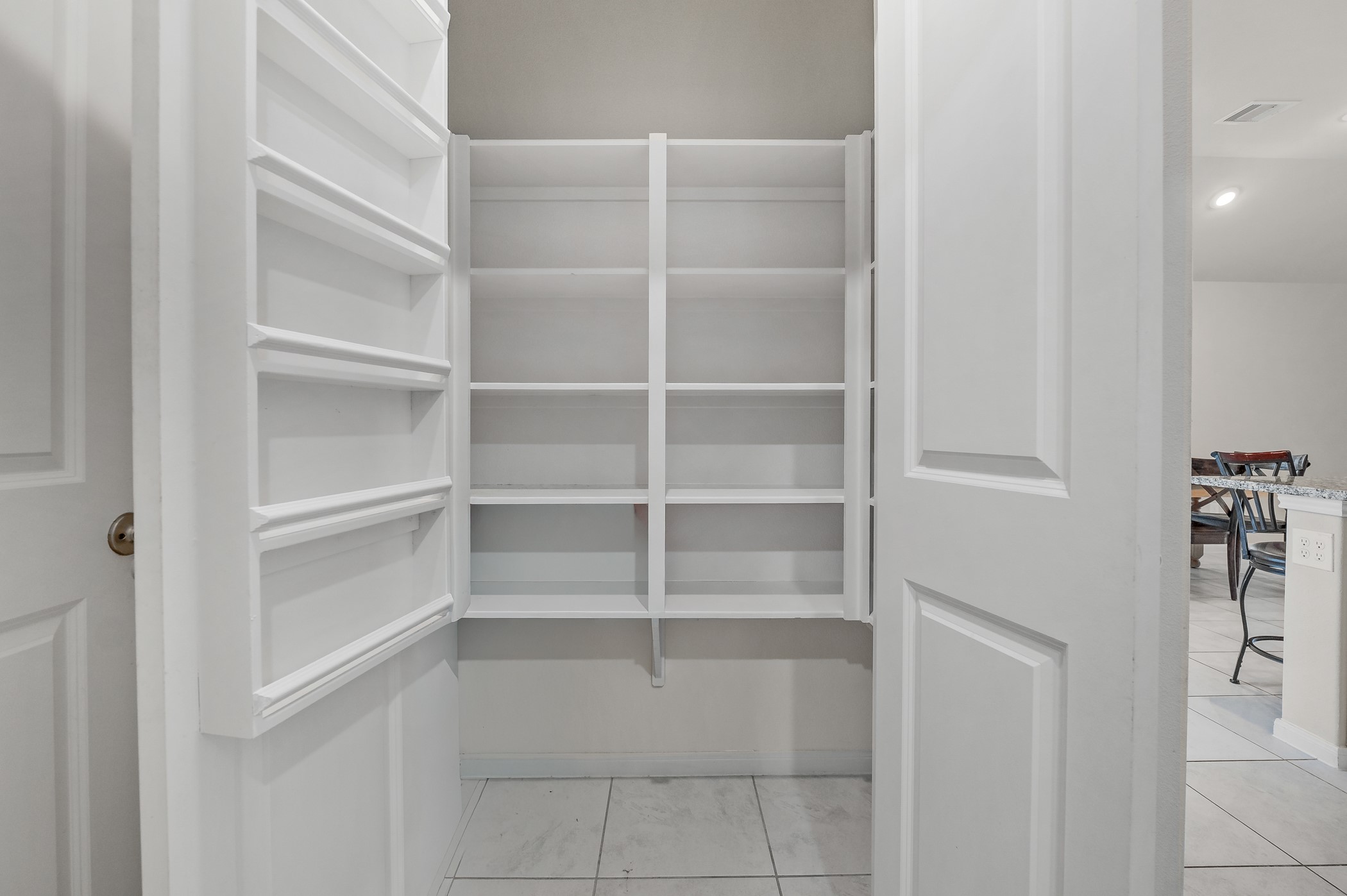3722 Amoroso Drive Rosharon, TX 77583 - Photo 15 of 27 a view of walk in closet with empty racks