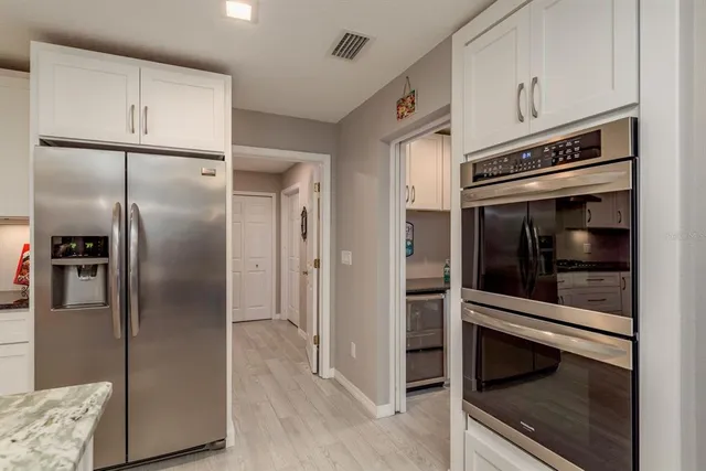 a kitchen with a sink and a cabinets
