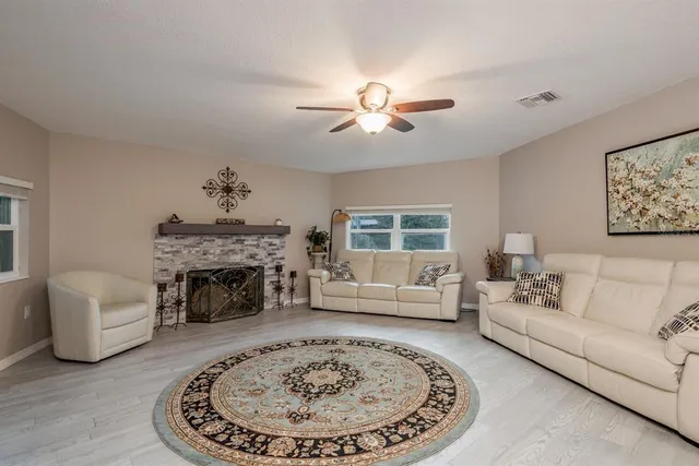 a view of a dining area with furniture and wooden floor