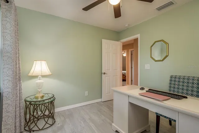 a bathroom with a toilet and a bathtub