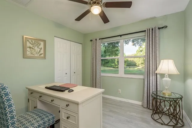 a view of a patio with a backyard table and chairs