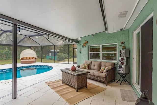 a view of a small house with a small yard