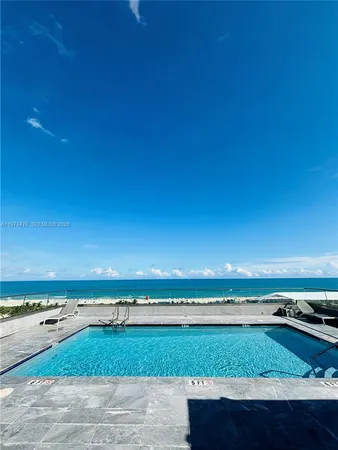 a view of an ocean and city