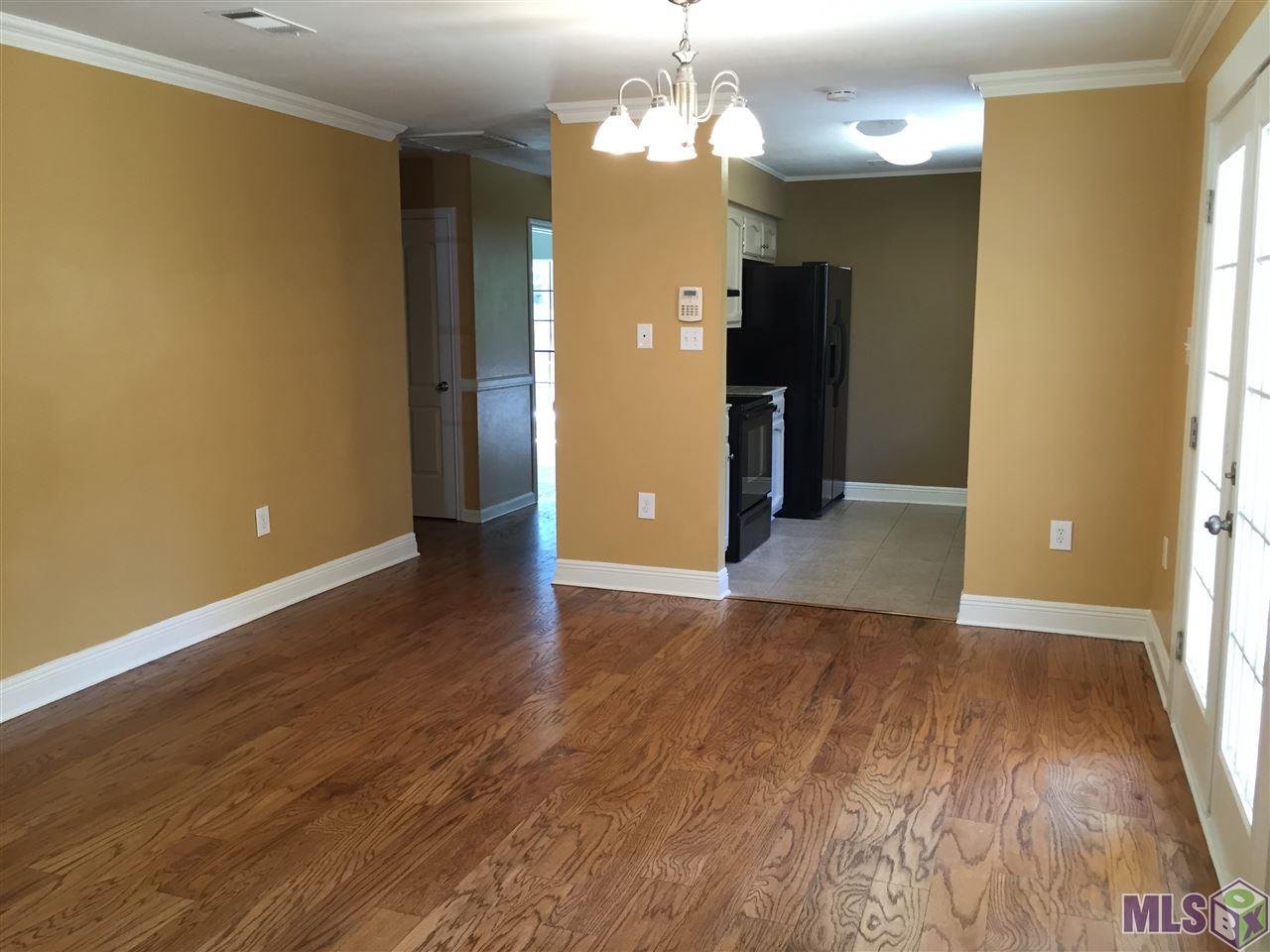 11139 Stanley Aubin Lane Baton Rouge, LA 70816 - Photo 8 of 24 Dining room and kitchen