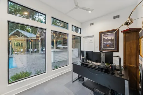 a bathroom with a sink vanity and mirror