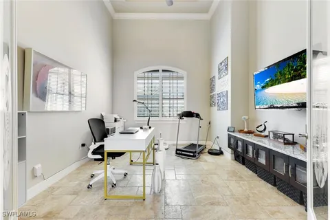 a workspace with furniture and window