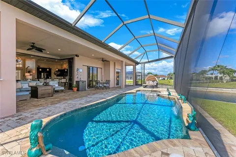 a view of a living room and kitchen