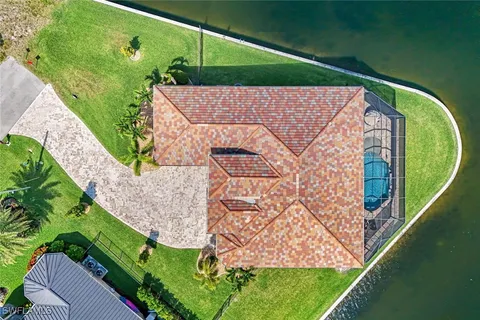 a view of a swimming pool with a yard