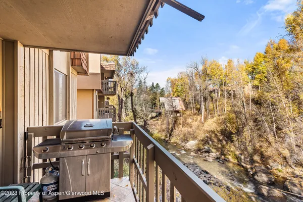 a view of a balcony with an outdoor space