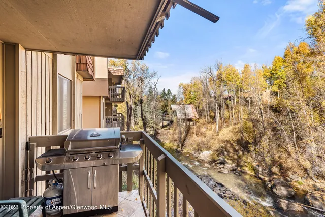a view of a balcony with an outdoor space