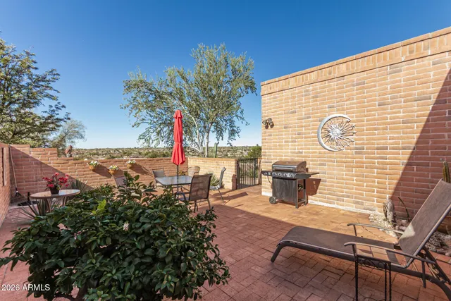 a backyard of a house with seating space
