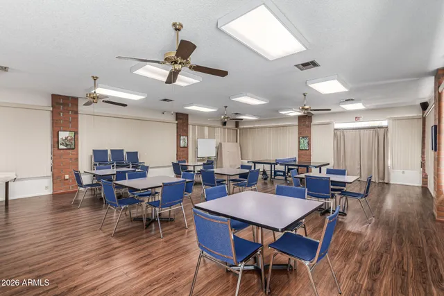 a view of a dining room with furniture