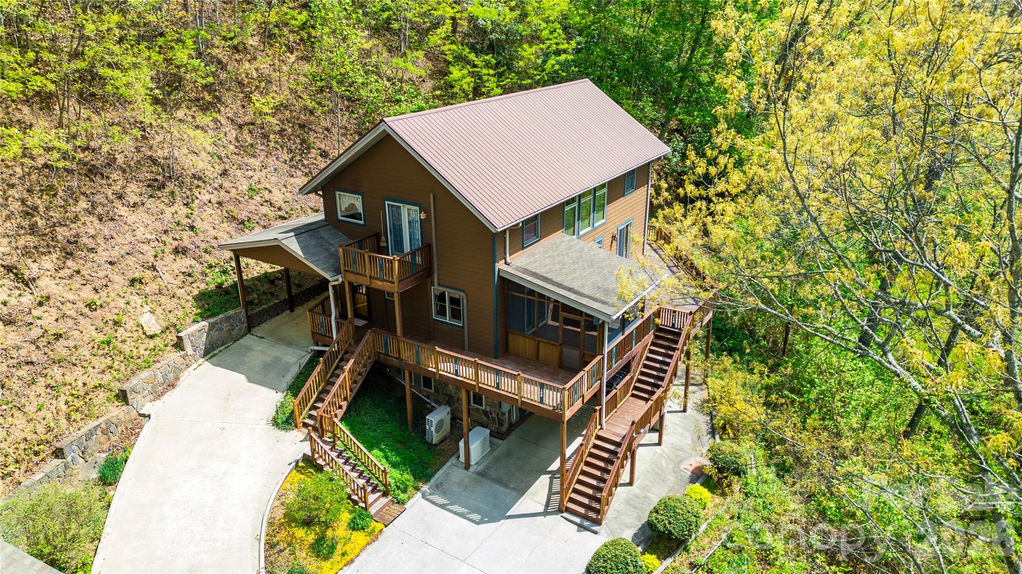 1602 Forest Run Road Whittier, NC 28789 - Photo 2 of 42 a aerial view of a house with a yard and furniture
