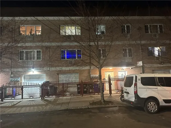 a car parked in front of a building