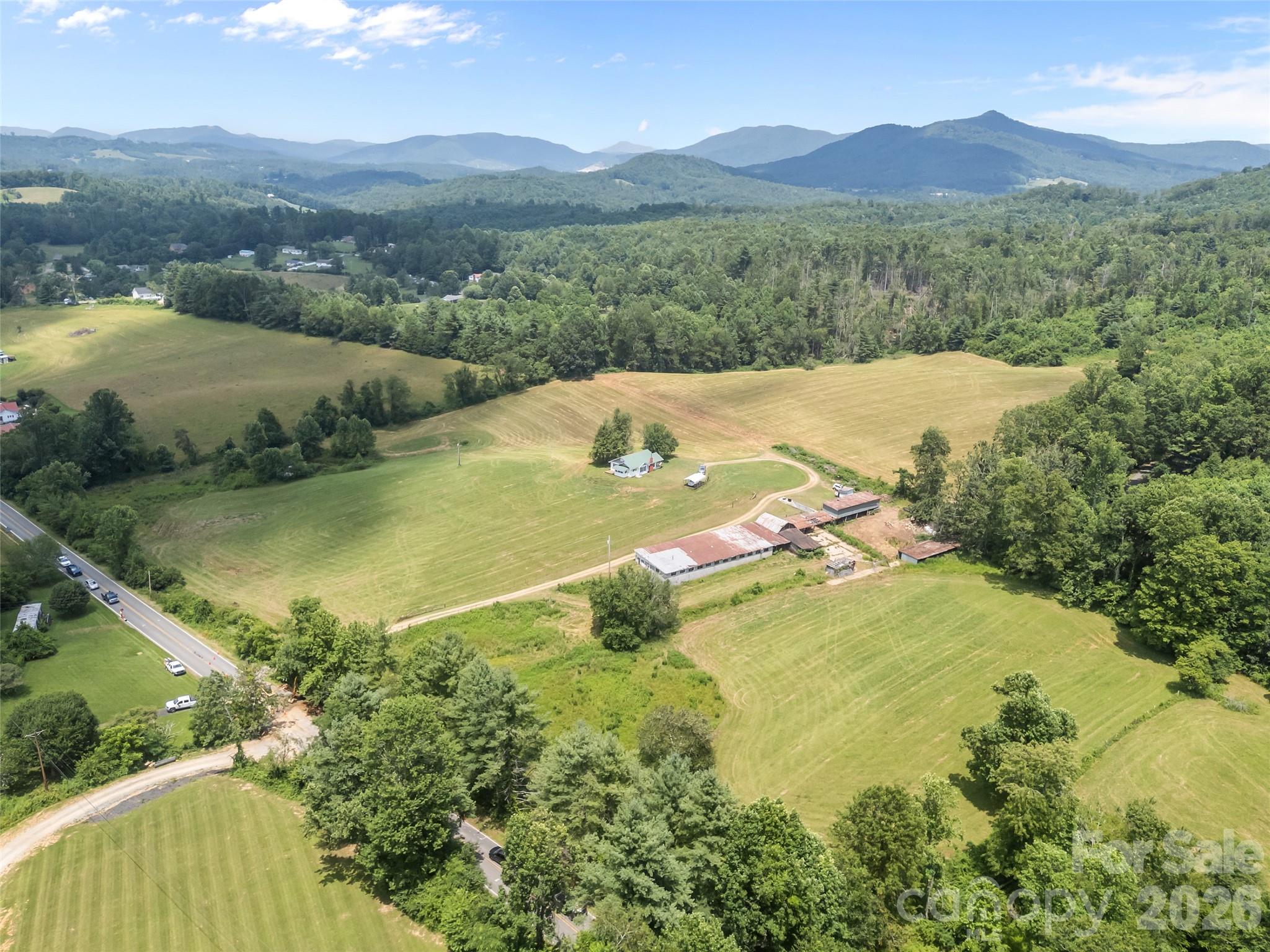 1305 Halltown Road Spruce Pine, NC 28777 - Photo 14 of 45 a view of a mountain from a lake