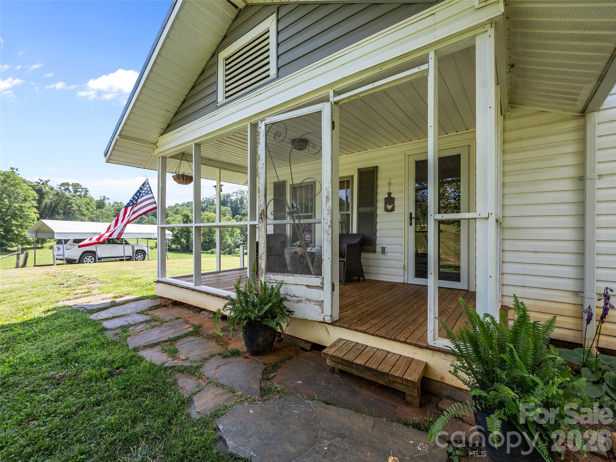 1305 Halltown Road Spruce Pine, NC 28777 - Photo 20 of 45 a swimming pool with outdoor seating and yard