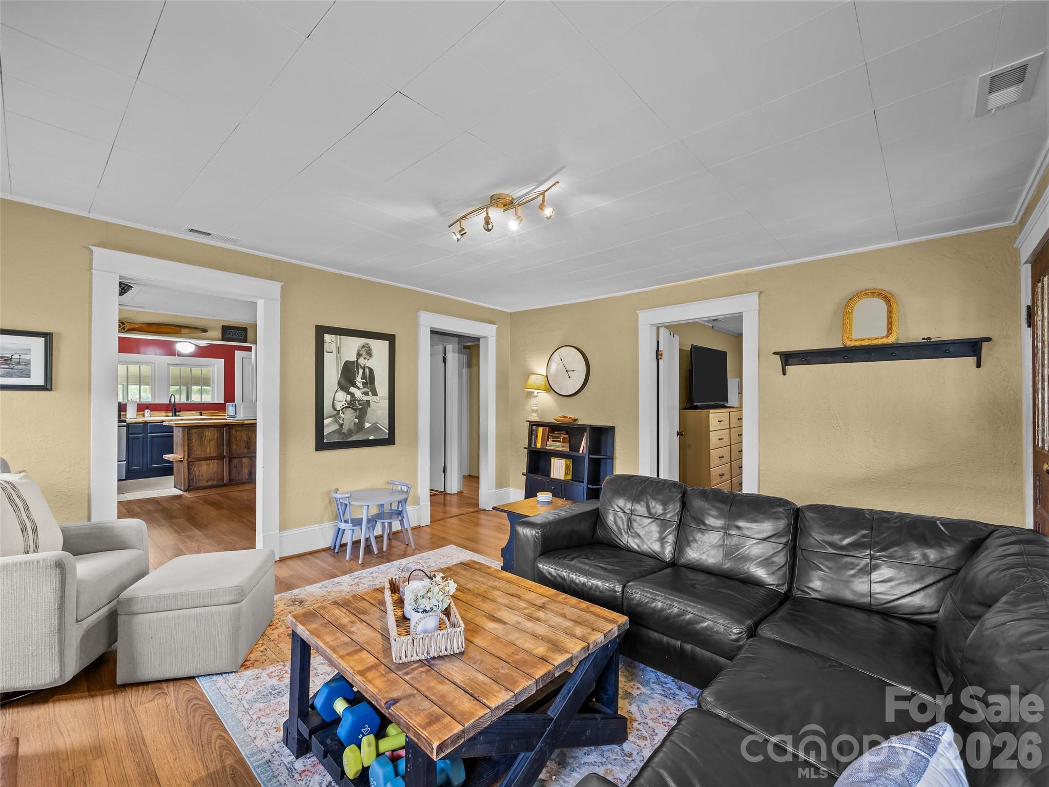 1305 Halltown Road Spruce Pine, NC 28777 - Photo 25 of 45 a living room with furniture and a table
