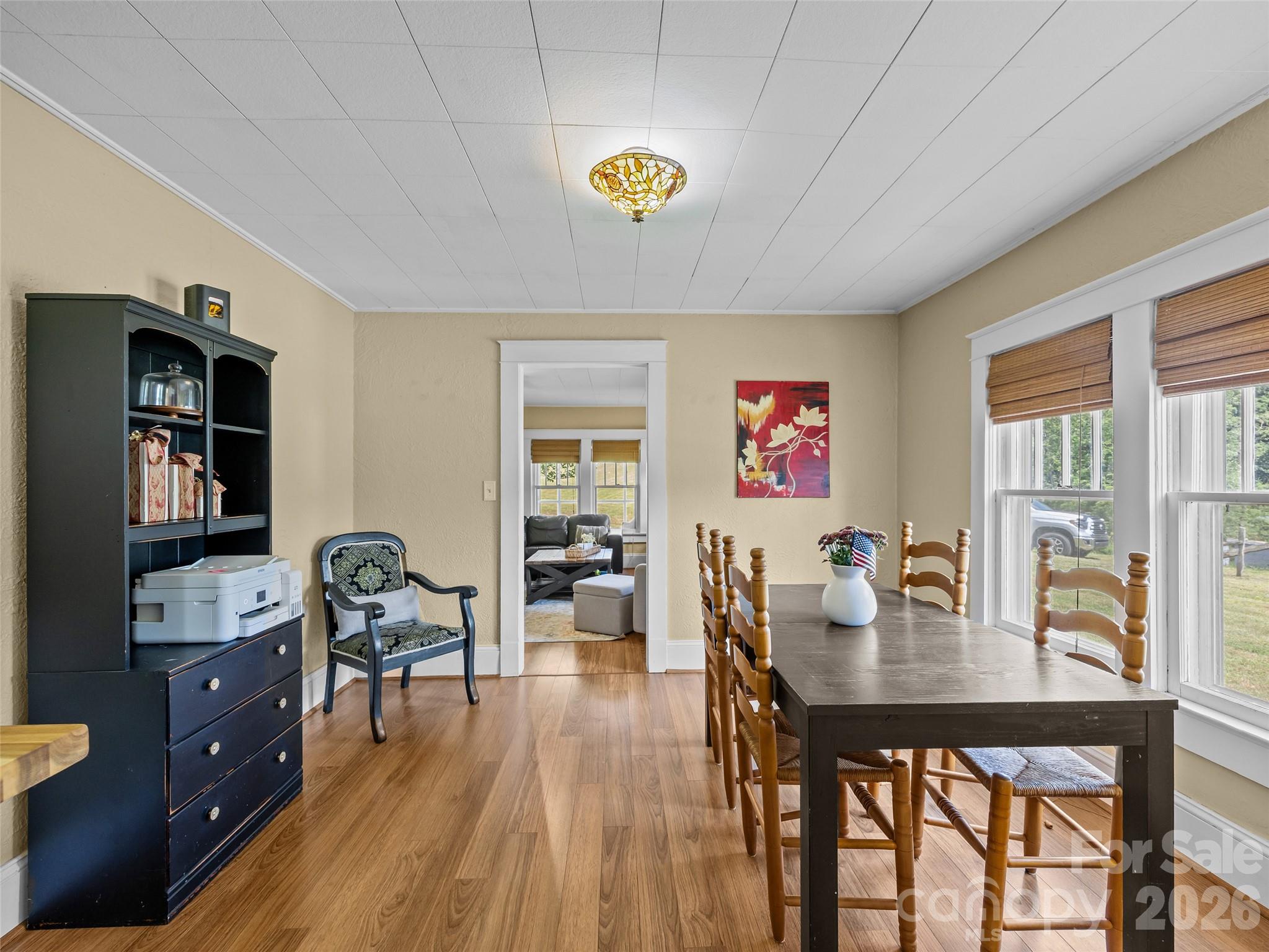 1305 Halltown Road Spruce Pine, NC 28777 - Photo 31 of 45 a dining room with furniture and wooden floor