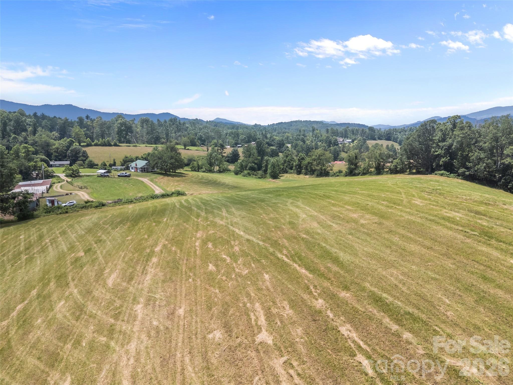1305 Halltown Road Spruce Pine, NC 28777 - Photo 4 of 45 a view of an outdoor space and mountains