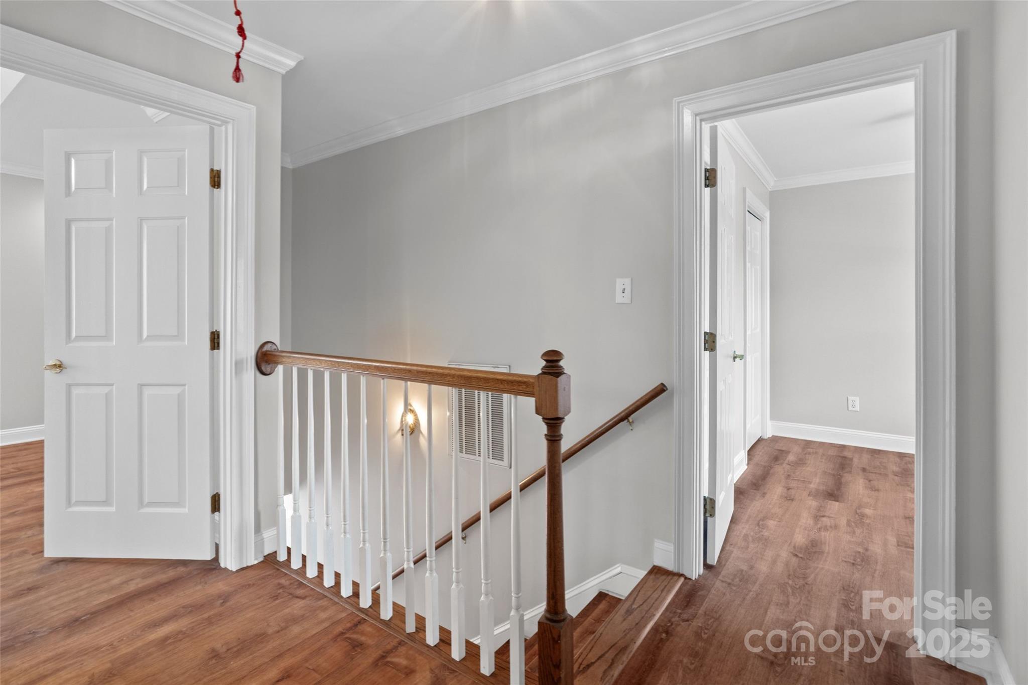 2082 Egret Court Rock Hill, SC 29732 - Photo 16 of 36 a view of a hallway with wooden floor and entryway