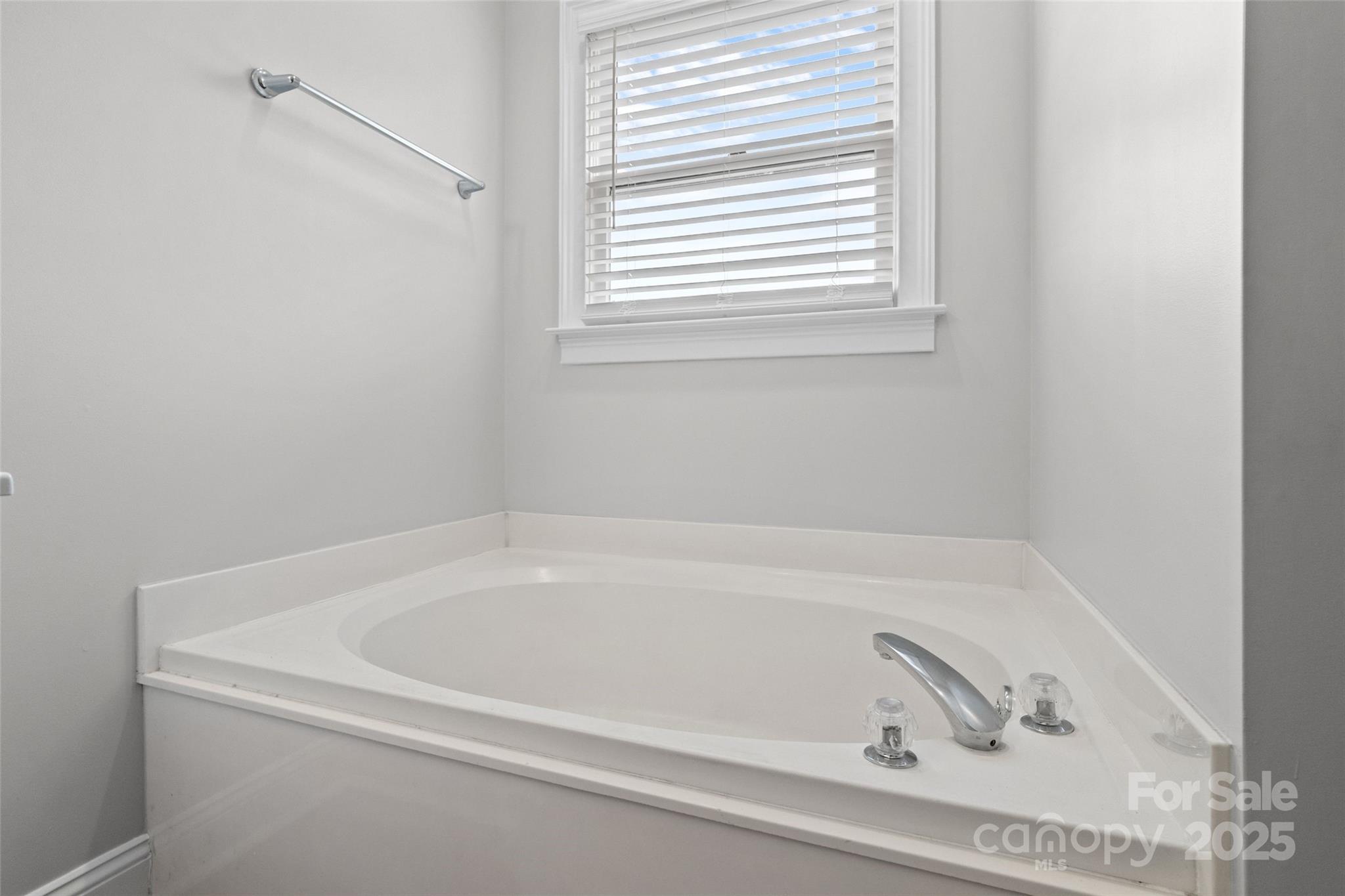 2082 Egret Court Rock Hill, SC 29732 - Photo 20 of 36 a white bath tub sitting next to a window
