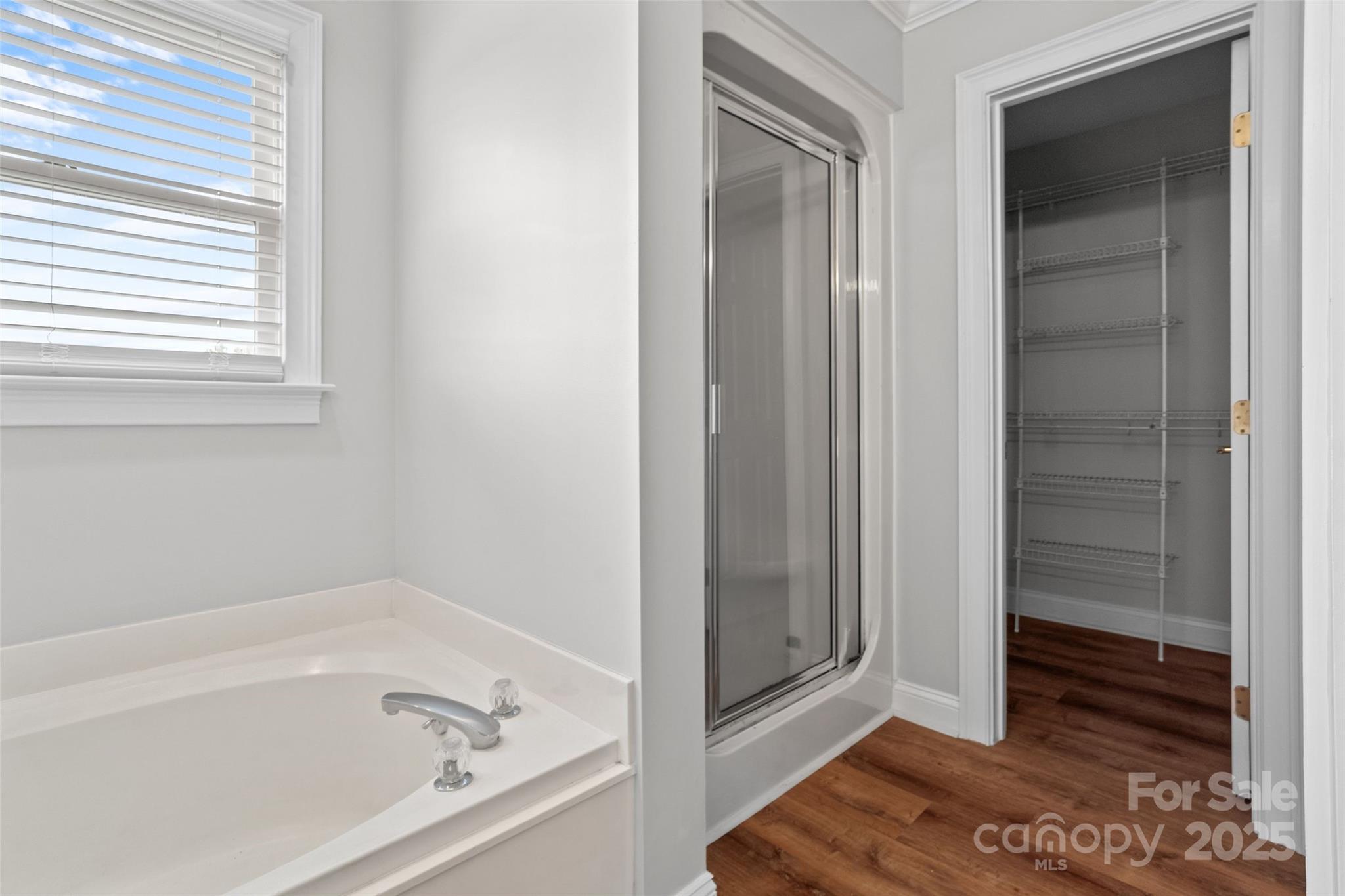 2082 Egret Court Rock Hill, SC 29732 - Photo 21 of 36 a bathroom with a bathtub and shower