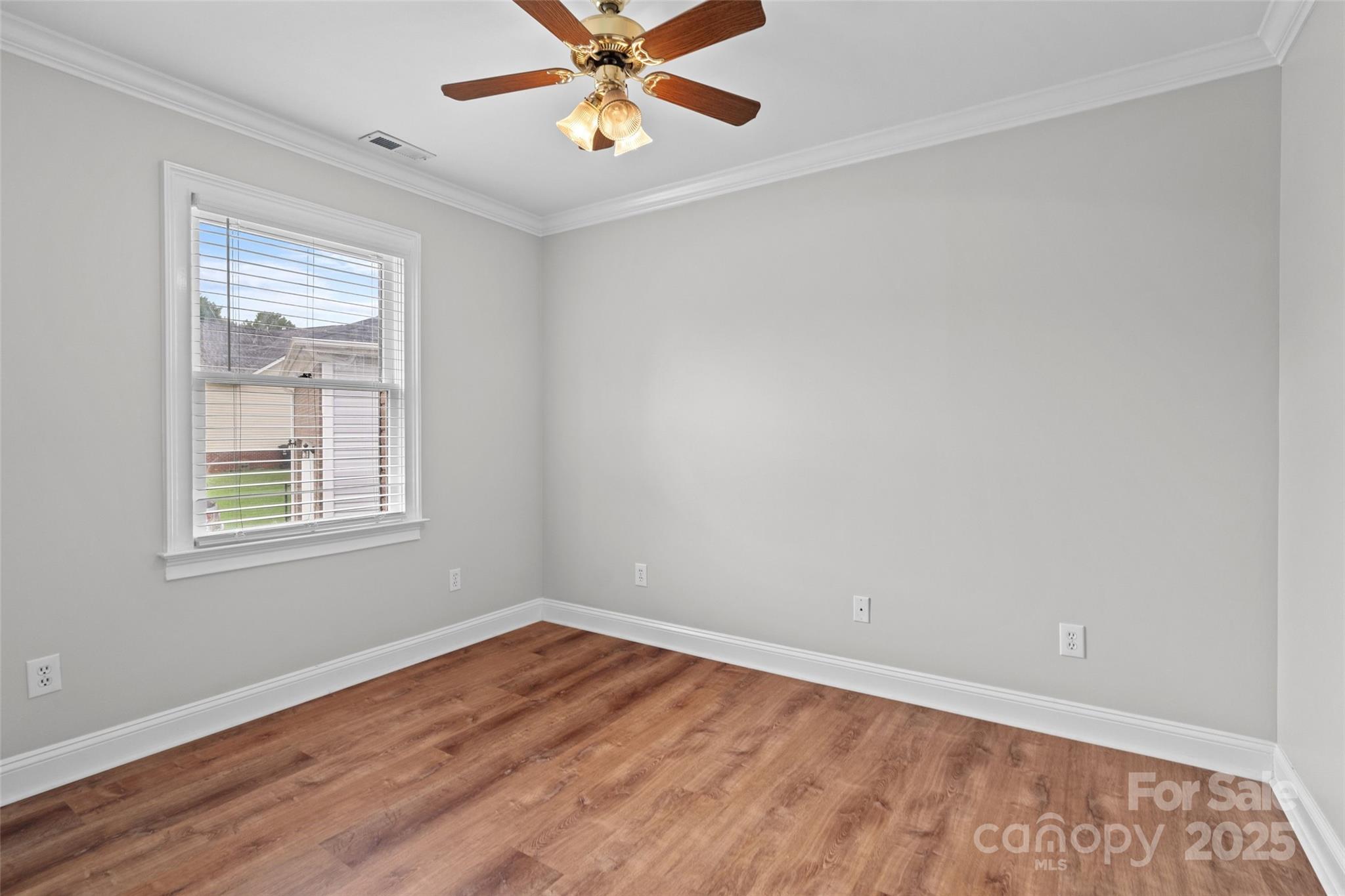 2082 Egret Court Rock Hill, SC 29732 - Photo 24 of 36 wooden floor in an empty room with a window